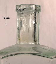 Image of a patent finish on a late 19th century medicine bottle; click to enlarge.