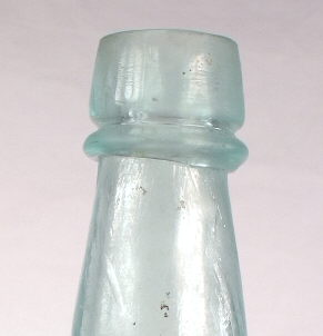 Export finish on a ca. 1880 beer bottle; click to enlarge.