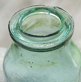 Pressed ring wax seal finish close-up; click to enlarge.