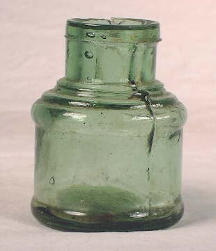 Early crude machine-made ink bottle; click to enlarge.