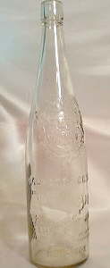 Early 20th century Virginia Dare wine bottle; click to enlarge.