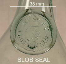 Close-up picture of a blob seal on a mid 19th century French wine bottle; click to enlarge.