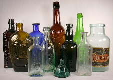 Group of historic bottles dating between 1840 and 1930.