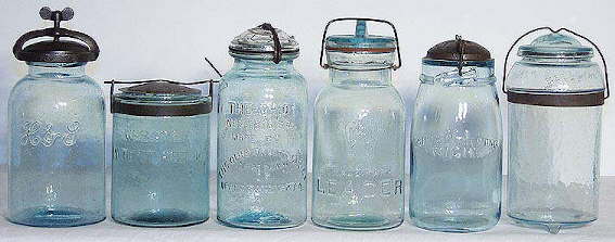 Group of fruit jars with different closures.