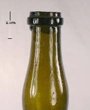 Image of a champagne style finish on a mid 19th century bitters bottle; click to enlarge.
