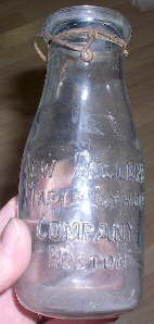 Milk bottle used for maple syrup; click to enlarge.