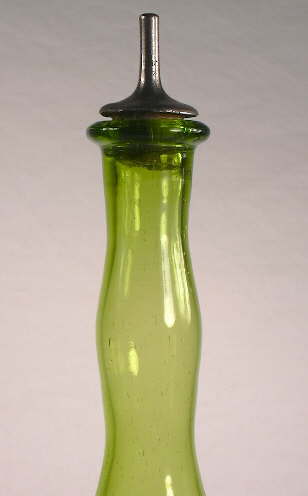 Sprinkler closure in a late 19th century barber bottle; click to enlarge.